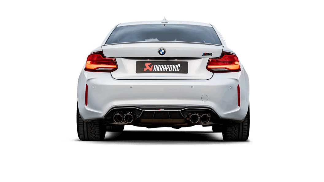 Rear view of a white BMW M2 with Akrapovic twin pipe either side, exhaust fitted