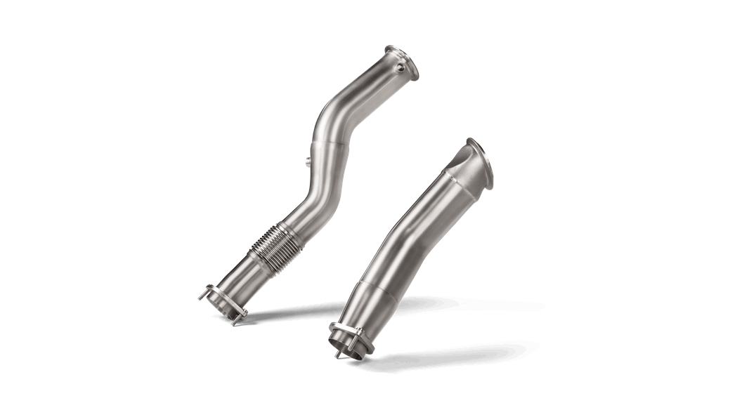 A pair of Akrapovic Titanium downpipes, one with a flexible section