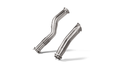 A pair of Akrapovic Titanium downpipes, one with a flexible section