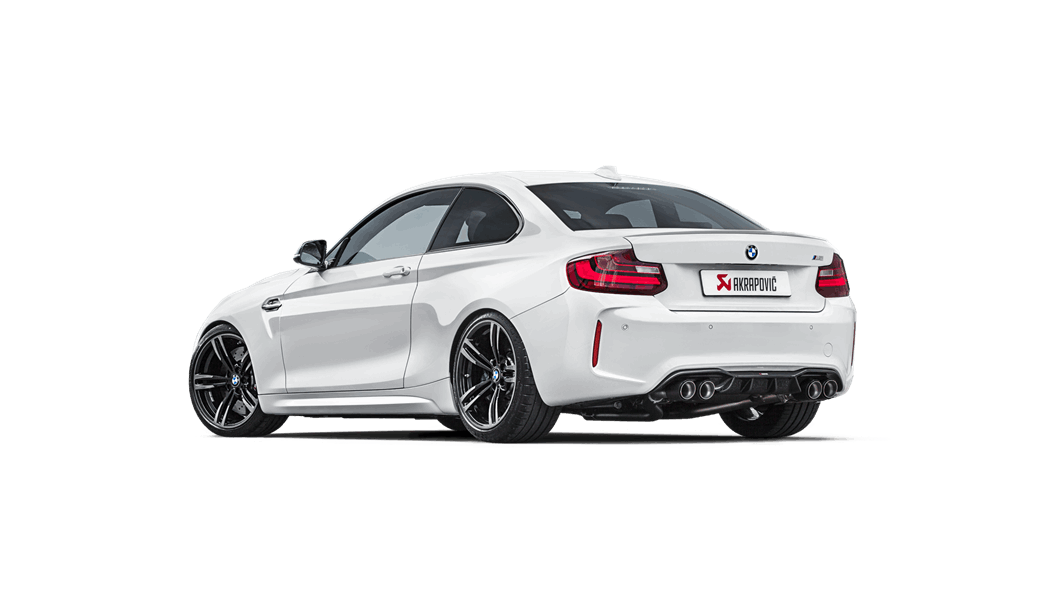 White BMW M2 with Akrapovic exhaust and twin pipes on each side, side rear view