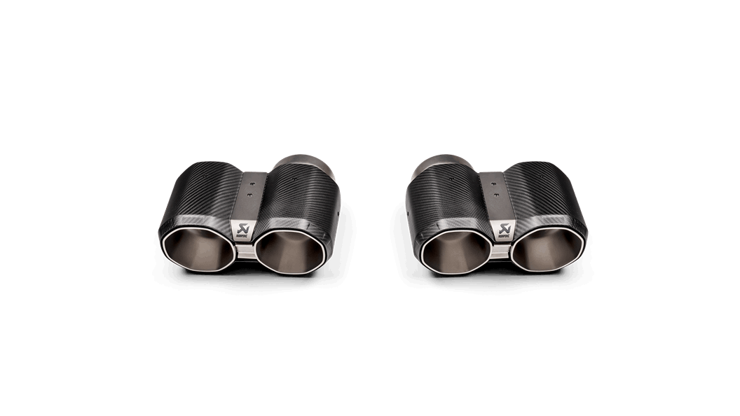 Aerial view of two pairs of Akrapovic carbon fibre exhaust tail pipe tips with an Octagonal end shape