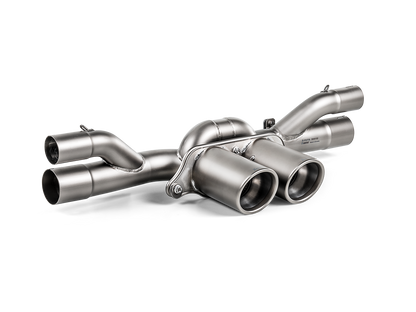 Front side view of an Akrapovič titanium exhaust rear section with triple, twin, exit pipes