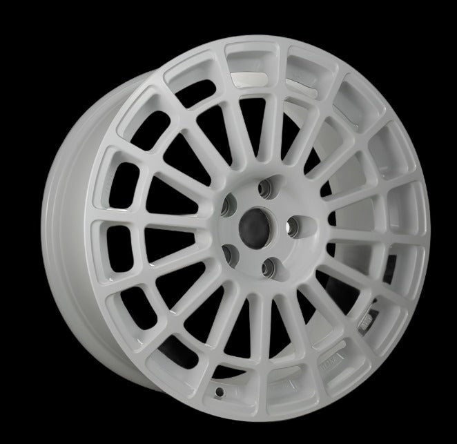 Front view of a Monte Corse 18-inch white wheel with a multi-spoke design against a black background 